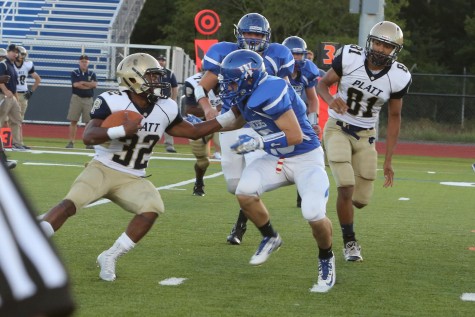 Senior Justin Keating goes after the ball carries in action last season.