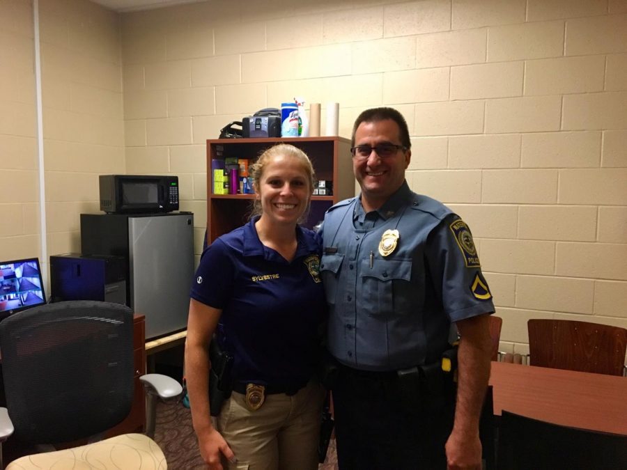 New SRO Megan Sylvestre (left) poses alongside retiring SRO Steve Whitehead (right) inside the security office. September 12, 2019.