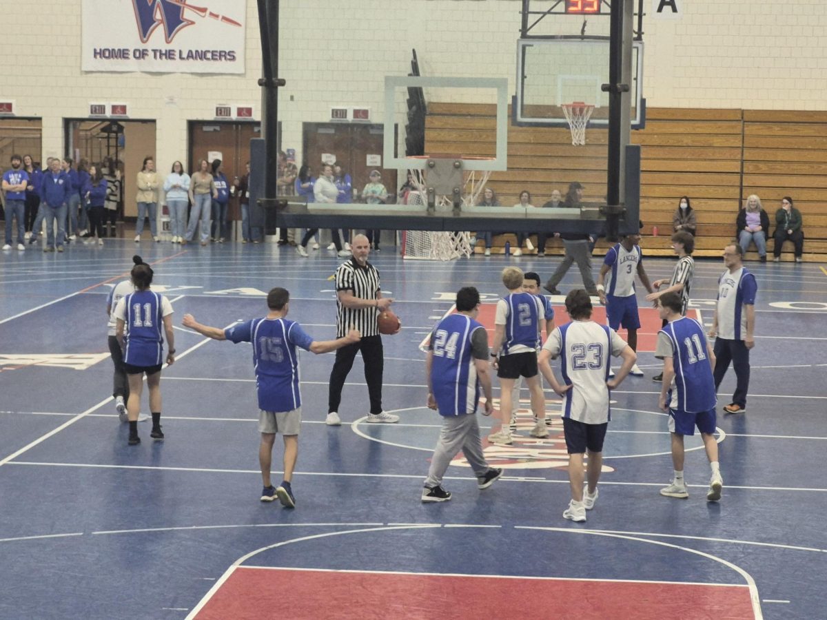 Teams getting ready for tip off.
